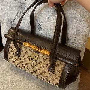 This is an Authentic Gucci Bamboo Papillon monogram Brown Leather Bag